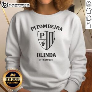 Awesome Camiseta Pitombeira Olinda Pernambuco logo sweatshirt displayed on a wooden background, showcasing vibrant design.