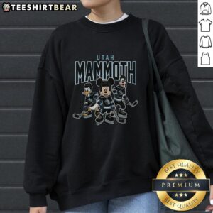 Awesome Utah Mammoth Disney Team ice hockey sweatshirt featuring vibrant colors and a stylish design.