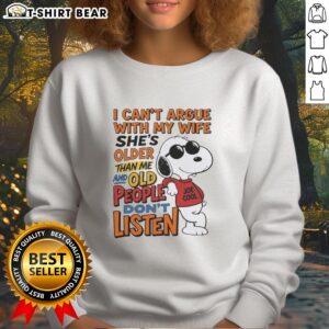 Alt Text: Retired husband wearing I Can't Argue With My Wife sweatshirt, humorously showcasing age difference and marriage dynamics.