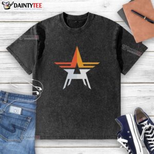 Vintage washed t-shirt featuring the Houston Astros star logo, perfect for baseball fans and retro style enthusiasts.