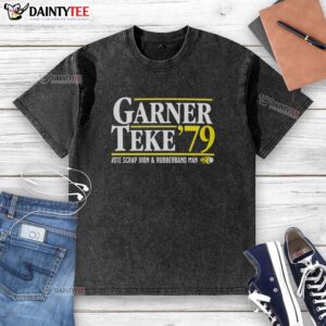 Nice Garner Teke 79 Vote Scrap Iron and Rubberband Man washed t-shirt displayed on a wooden surface.