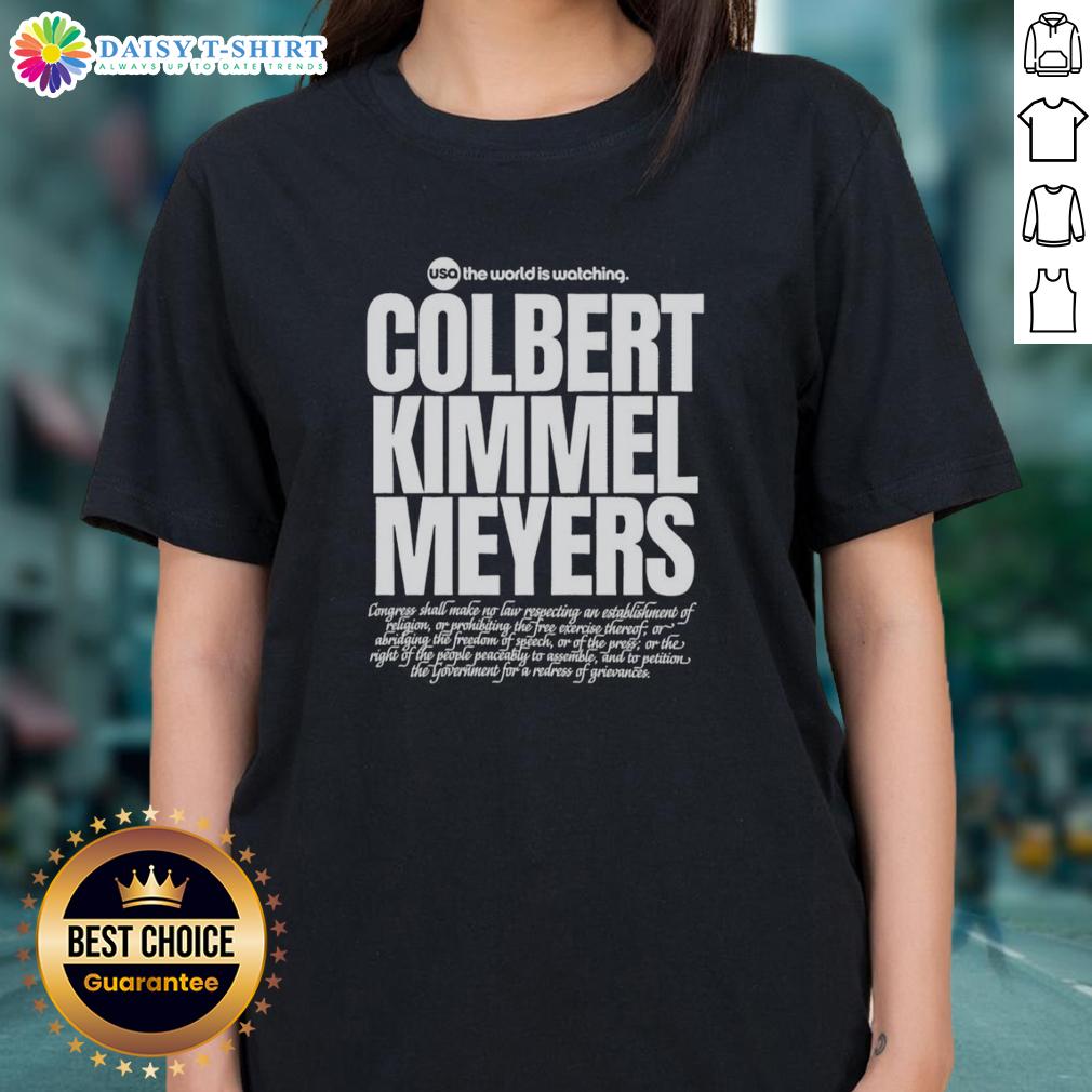 Top Usa The World Is Watching Colbert Kimmel Meyers Ladies Tee Top USA The World is Watching Colbert Kimmel Meyers Ladies Tee featuring iconic late-night host graphics and vibrant colors.