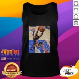 Hot Joel Embiid in a stylish Philadelphia 76ers tank top, showcasing his team spirit and athleticism on the court.