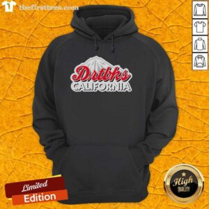 Person wearing a Nice Head To The Mountains Drtbks California hoodie with a scenic mountain backdrop.