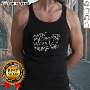 Lady Gaga wearing a humorous tank top with her dog looking unimpressed, showcasing her unique fashion sense.
