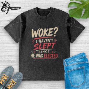 Alt Text: Top Woke I Haven't Slept Since He Was Elected washed t-shirt featuring a bold political statement design.