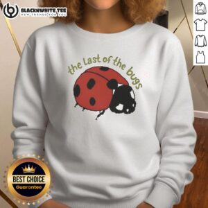 Hot Indie Folk Concert featuring The Last Of Bugs sweatshirt worn by fans enjoying live music and vibrant atmosphere.