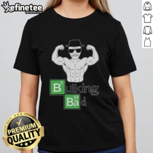 Muscular old man posing with biceps in a 'Bulking Bad' tee, showcasing strength and style for fitness enthusiasts.