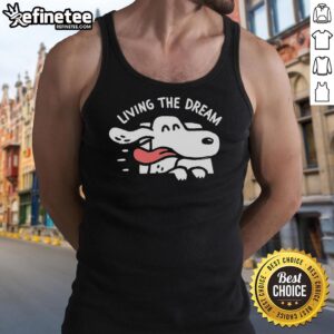 Woman wearing a Nice Dog Days Living The Dream tank top while enjoying a sunny day outdoors with her dog.