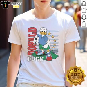 Alt Text: Cute Donald Duck soccer T-shirt featuring vibrant graphics, perfect for Disney fans and sports enthusiasts.
