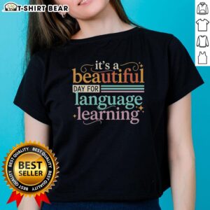 Vintage ladies tee featuring 'It's a Beautiful Day for Language Learning' design, perfect for language enthusiasts.