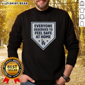 Cozy Los Angeles Dodgers sweatshirt promoting safety and comfort at home, perfect for fans and relaxation.