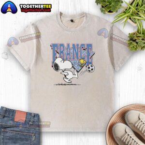 Top Peanuts Snoopy X France Soccer washed t-shirt featuring Snoopy in a soccer jersey, perfect for fans and collectors.
