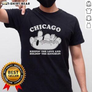 Alt Text: Top Chicago Snoopy T-Shirt featuring Snoopy holding ketchup and spreading love in a vibrant design.