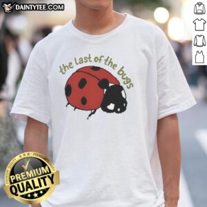 Good Indie Folk Concert featuring 'The Last Of Bugs' T-Shirt worn by fans enjoying live music outdoors.