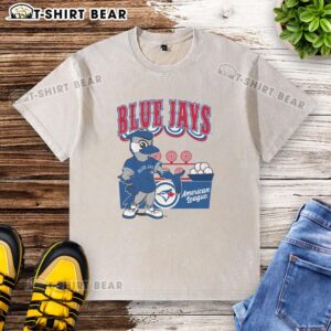 Alt Text: Top Mitchell & Ness Cream Toronto Blue Jays Step Back Up Washed T-Shirt featuring vintage logo and relaxed fit.