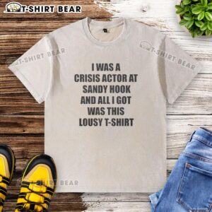 Alt Text: Top I Was A Crisis Actor At Sandy Hook T-shirt featuring a humorous design about crisis actors and conspiracy theories.