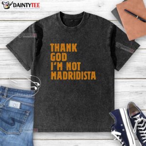 Stylish 'Nice Thanks God I'm Not Madridista' washed t-shirt in casual wear, perfect for football fans and casual outings.