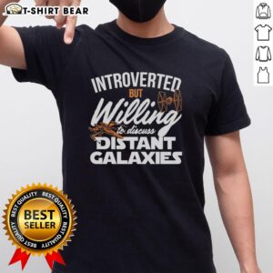 Awesome introverted but willing to discuss distant galaxies Star Wars-themed t-shirt featuring iconic space graphics.