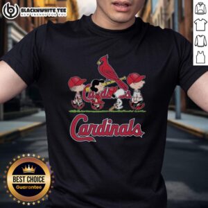 Alt Text: Cute Snoopy, Charlie Brown, Linus, and Lucy wearing St. Louis Cardinals baseball jersey t-shirts, perfect for fans.