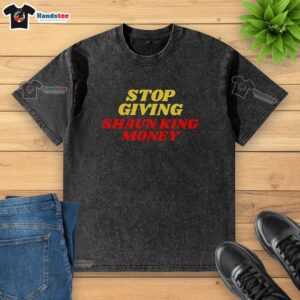 Official Support Causes Not Scams Awareness washed t-shirt featuring a bold graphic design promoting social awareness.