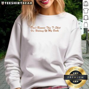 Good Don't Remove This T-Shirt - Orange Text Sweatshirt holding up my boobs, perfect for a fun and casual look.