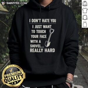 Vintage hoodie featuring the phrase 'I just want to touch your face with a shovel really hard' in bold lettering.