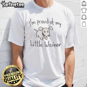 Alt Text: Cute dachshund wearing 'I'm Proud Of My Little Weiner' T-shirt, showcasing a playful and fun pet fashion statement.