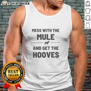 Model wearing 'Top Mess With The Mule Get The Hooves' tank top, showcasing a fun design perfect for casual summer outfits.