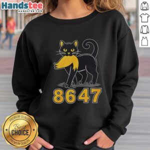Nice black cat wearing an Anti-Trump sweatshirt, showcasing a playful and political fashion statement.