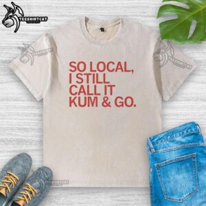 Premium So Local I Still Call It Kum And Go Red Text Washed T-Shirt, featuring bold red lettering on a casual t-shirt.
