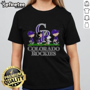 Good Snoopy, Charlie Brown, Linus, and Lucy wearing Colorado Rockies baseball jerseys on a ladies' tee.