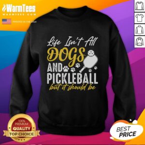 Cozy sweatshirt featuring Life Isn't All Dogs And Pickleball, But It Should Be design for dog and pickleball lovers.