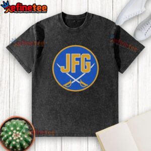 Alt Text: Original Buffalo Sabres JFG River Hockey Academy logo washed t-shirt featuring a vintage design and vibrant colors.