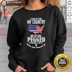 Funny sweatshirt featuring 'I Love My Wife, My Country, And Getting Pegged' slogan for humorous apparel lovers.