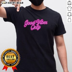 Alt Text: Pretty Good Vibes Only Purple Neon T-Shirt featuring vibrant neon lettering on a stylish purple fabric.