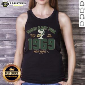 1969 Pretty Peanuts Music and Art Fair Snoopy tank top featuring colorful graphics and retro design.