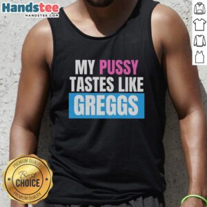 Woman wearing a 'Nice My Pussy Tastes Like Greggs' tank top, showcasing a fun and playful graphic design.