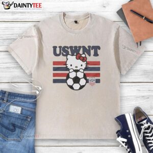 Good Hello Kitty hugging a soccer ball, featuring the USWNT logo on a washed t-shirt, perfect for soccer fans.
