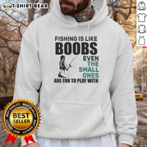 Humorous meme hoodie featuring 'Nice fishing is like boobs' quote, highlighting fun in fishing and playful design.