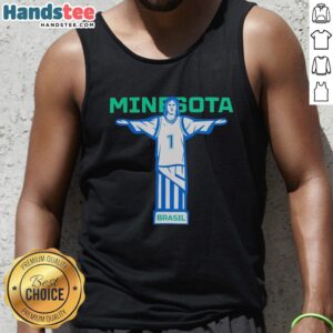 Alt Text: Anthony Edwards wearing a Christ the Redeemer tank top during a basketball game in Nice, Minnesota.