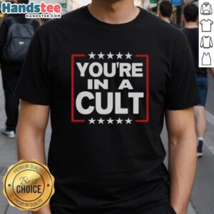 Alt Text: Original You're In A Cult Satirical Political Statement Stars T-Shirt featuring bold text and star graphics.