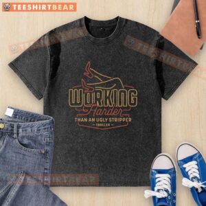 Awesome working harder than an ugly stripper troll co red yellow neon style washed t-shirt displayed on a hanger.