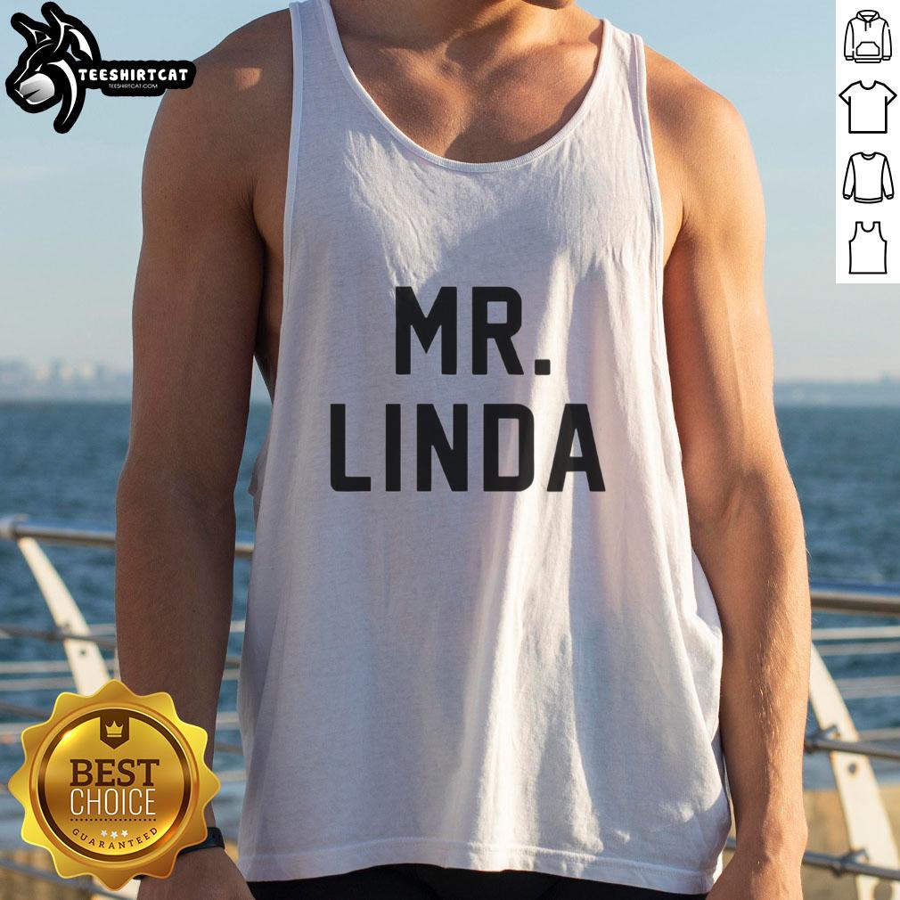 nice-mr-linda-johnny-knoxville-tank-top Alt Text: Johnny Knoxville wearing a Nice Mr. Linda tank top, showcasing a stylish casual look for summer.
