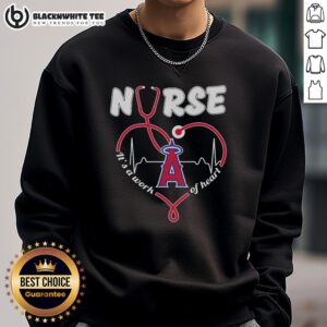 Cozy Los Angeles Angels nurse sweatshirt featuring 'It's a Work of Heart' design, perfect for fans and healthcare workers.