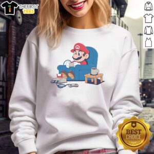 Stylish gamer boy wearing a Mario sweatshirt, showcasing vibrant colors and a trendy gaming aesthetic.