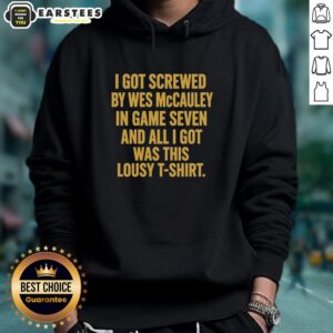 Fan wearing 'Good I Got Screwed by Wes McCauley in Game Seven' hoodie, showcasing team spirit and humor.