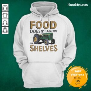 Vintage hoodie with 'Food Doesn't Grow on Shelves' slogan and a nice tractor graphic, perfect for farm and food lovers.