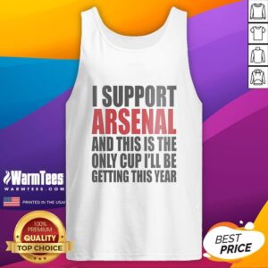 Arsenal fan wearing a humorous tank top that reads 'This is the only cup I'll be getting this year' at a game.