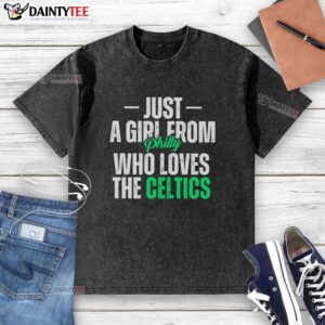 Official Just A Girl From Philly Who Loves The Celtics washed t-shirt displayed on a hanger, perfect for fans.